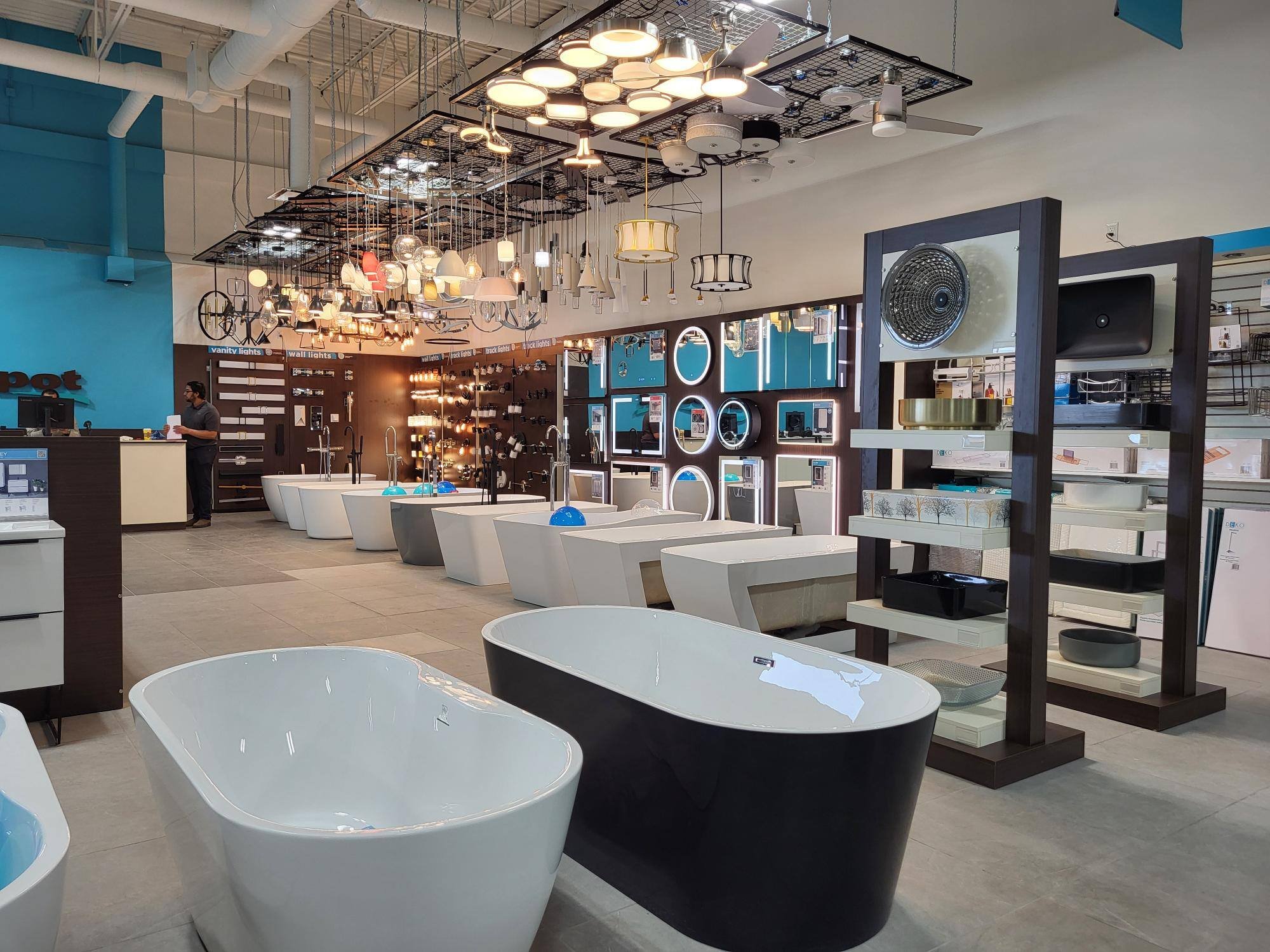 Bath Depot interior showing lighting, fixture installation, and new paint after DAVACO Canada interior remodel