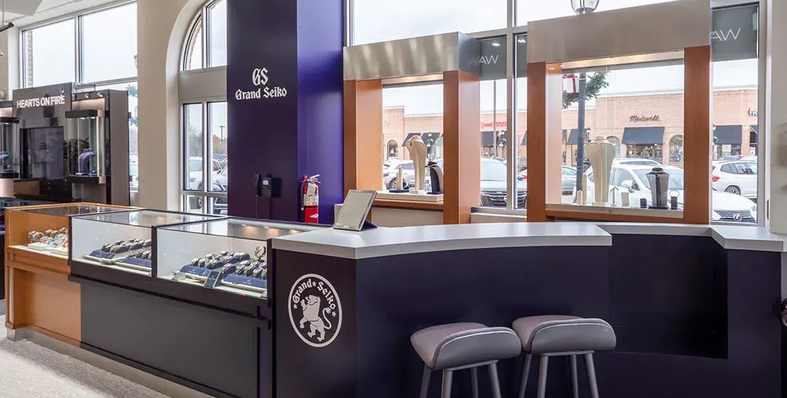Interior store fixture at Watches of Switzerland, reflecting meticulous maintenance in their comprehensive facilities management