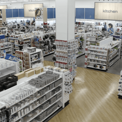 Aerial view of a kitchen section in a Bed Bath & Beyond store. Newly remodeled product shelving provides clean views of new kitchen products.