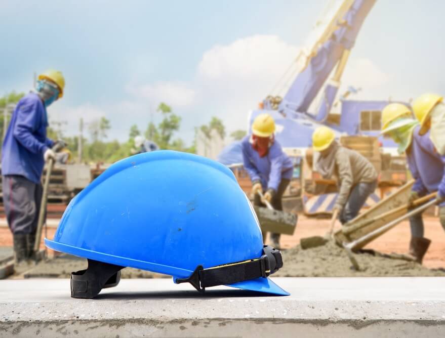 DAVACO Hard Hat with workers showing safety-first culture of protecting people and success