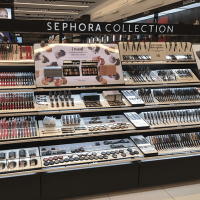 Black product display of Sephora branded cosmetics.