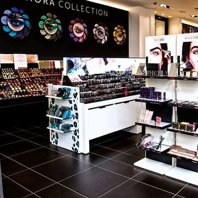 Colorful human eyes displayed on a black backdrop showing Sephora's branded cosmetics.