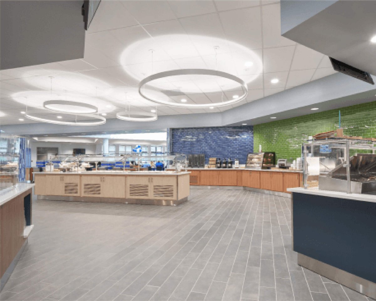 Remodeled US Air Force dining center, designed in eco-friendly wood, green & hues.